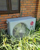 Condensadora externa em jardim